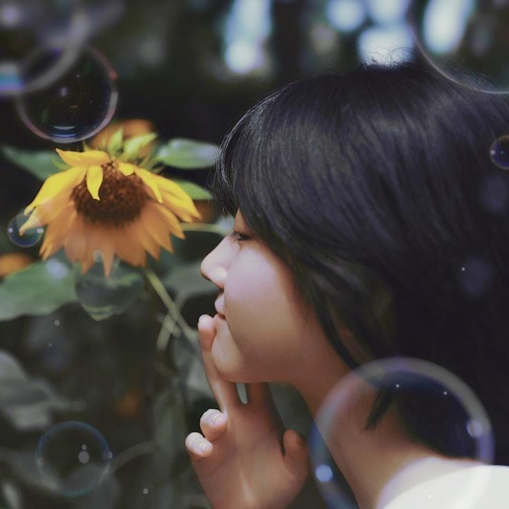 Kaveri Mehta, Lead Design Curator at Adaptive Capital Structure, reviewing corporate floral arrangements